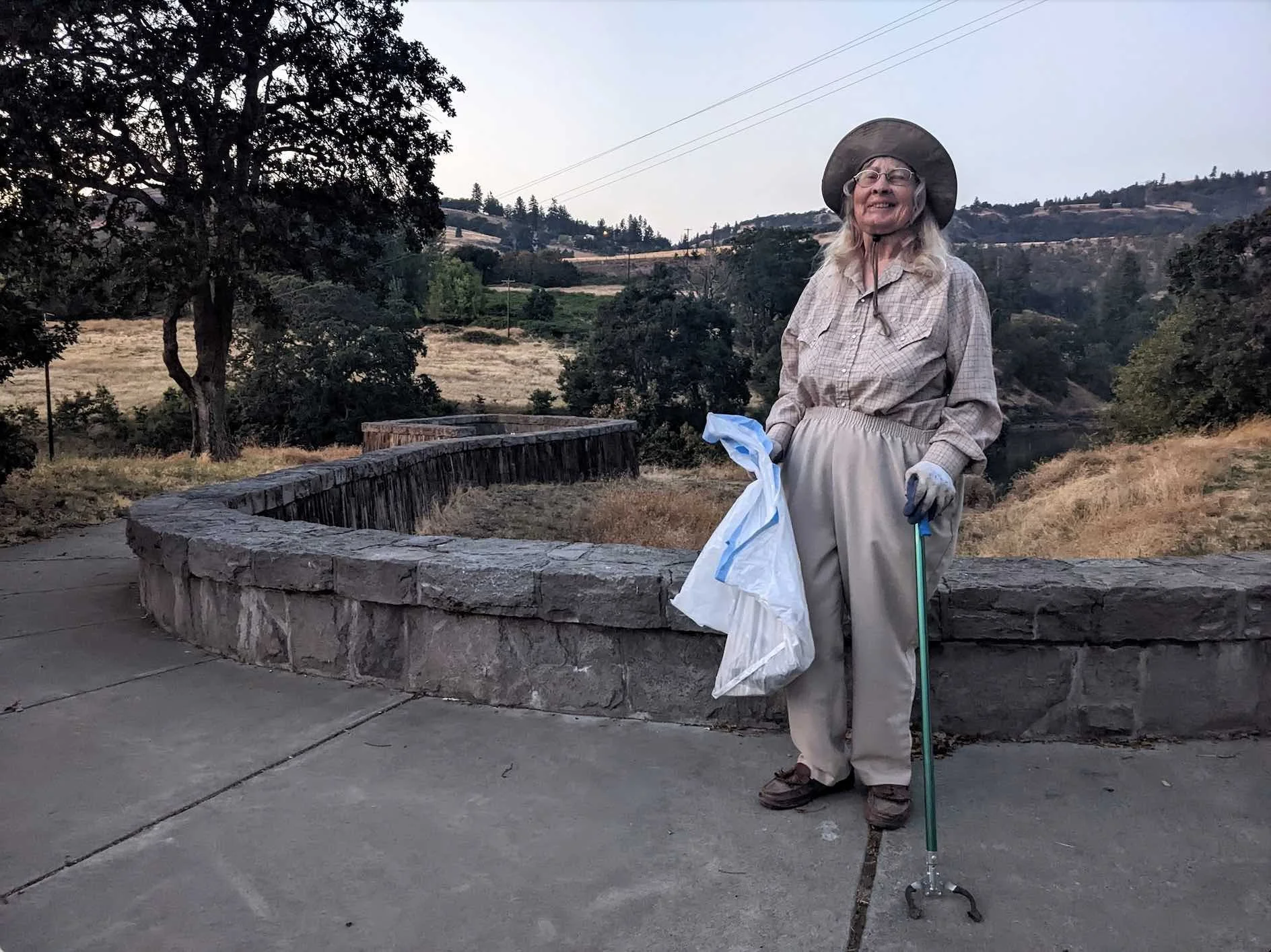 Who is this woman and why is she picking up trash at the Klickitat